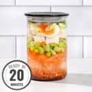 A sealed jar of all the constituent ingredients of an easy homemade ramen noodle soup, on a white surface with a time stamp in the bottom left hand corner | Hurry The Food Up